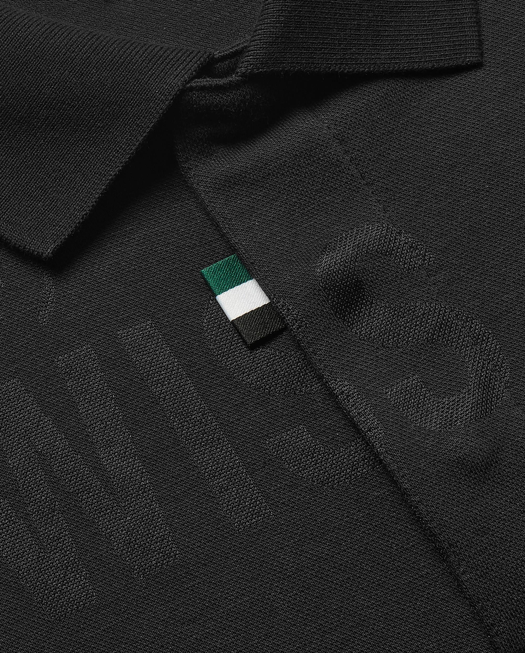 108279-008 | MEN'S ALL-OVER K-SWISS LOGO POLO SHIRT | BLACK